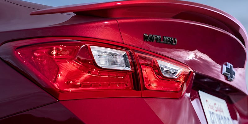 The right rear backlight point of view of a brand new Chevrolet Malibu